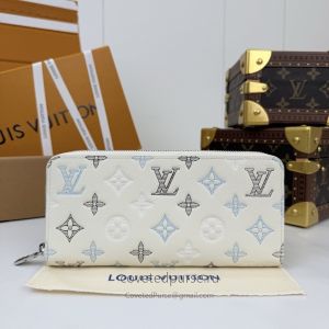Louis Vuitton Cream Raised Monogram Zip-Around Wallet Premium M29133